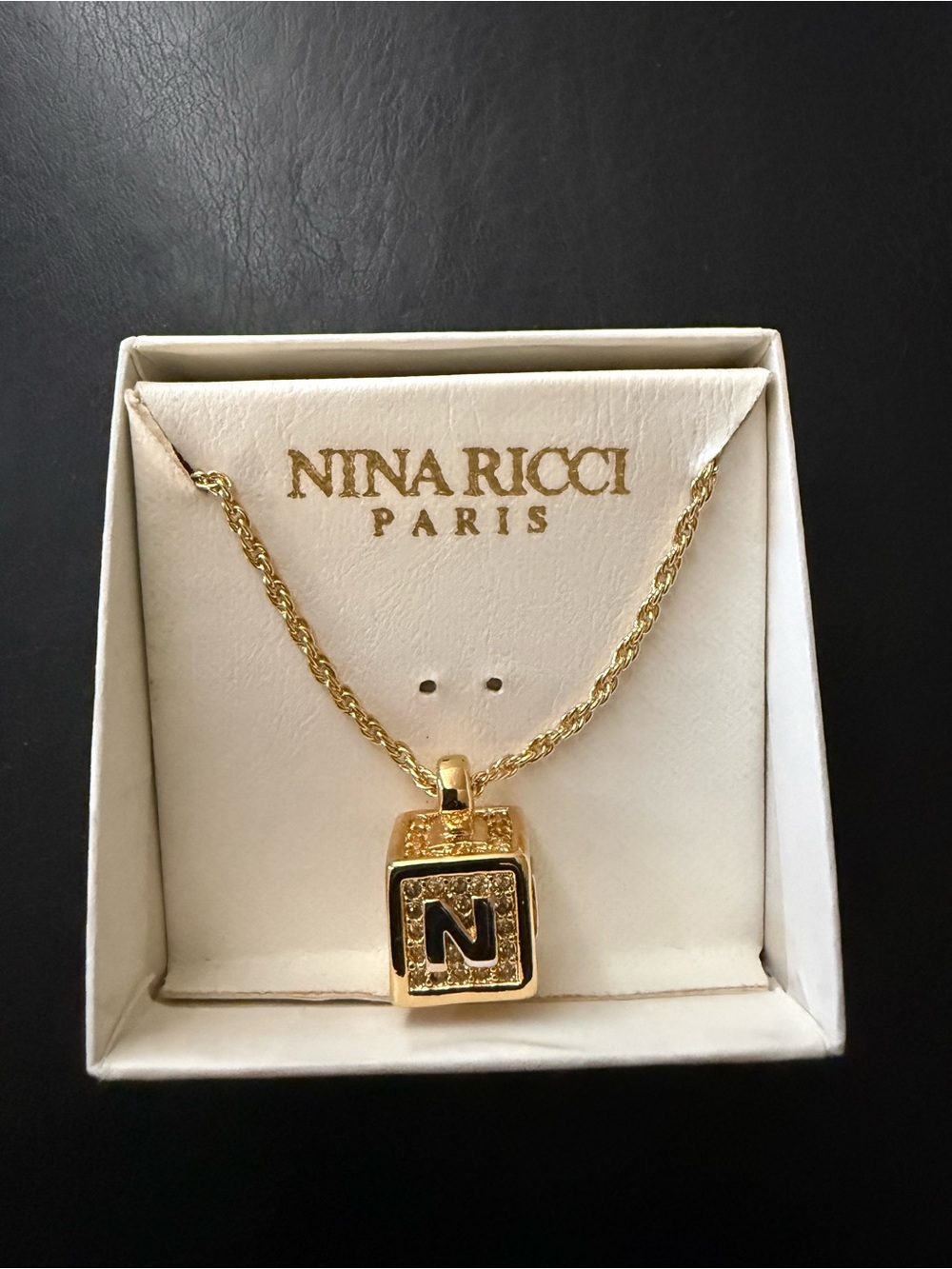 Nina Ricci Gold Tone Rope Chain Necklace with Black 'N' Initial Pendant